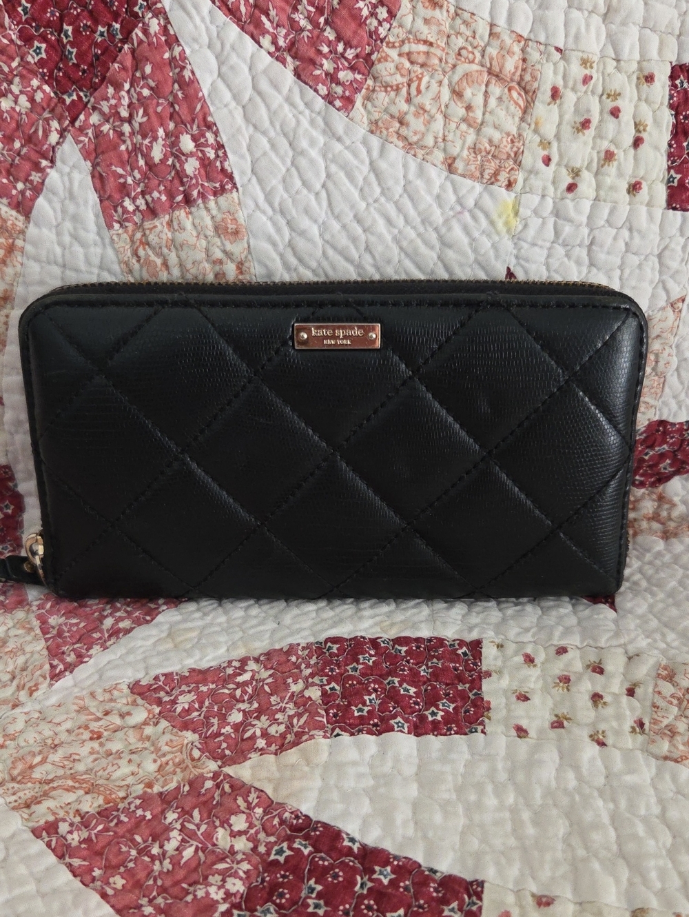 kate spade Black Quilted Zip-Around Wallet with Gold Plaque